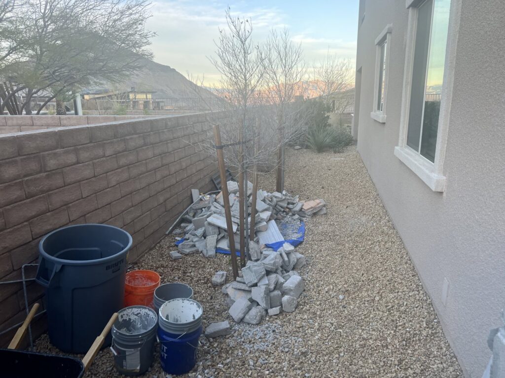 A pile of construction debris and broken concrete ready for removal by MGM Household Services in Las Vegas, NV.