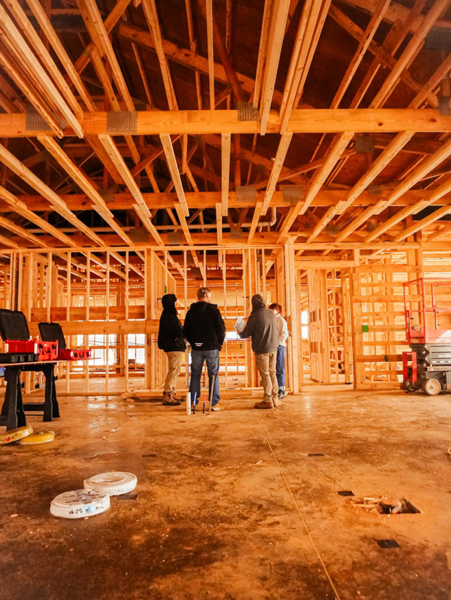 An overview of a barndominium construction site with a team and equipment by Nashville Barndo Builders in Franklin, TN.