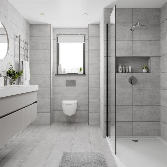 A contemporary bathroom remodel featuring gray tiles, a floating vanity, and a spacious walk-in shower by Esco Pros Remodeling in Chicago, IL.