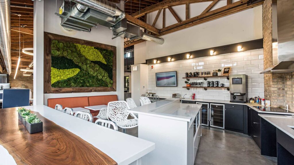 A contemporary kitchen design with white cabinets and a large island, expertly crafted by ETI Construction in Chicago, IL.