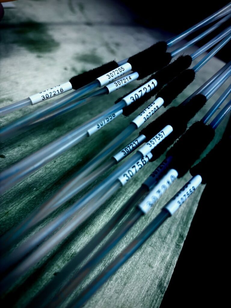 A contractor truck and trailer for Metronet on a rural road, indicating general contracting work by KPL Fiber Solutions LLC in Houston, TX.