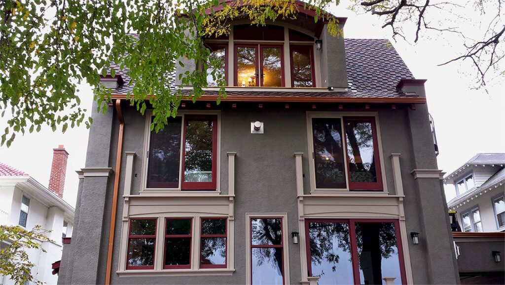 Elegant copper gutters installed on a multi-story residential house by Gutter Flow7 LLC in Madison, WI.