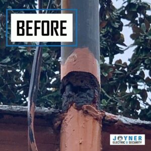 A corroded electrical conduit or pipe shown before repair by Joyner Electric And Security in Savannah, GA.