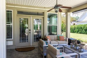 Covered patio with ceiling fan installation by American Home Improvements, LLC in Knoxville, TN