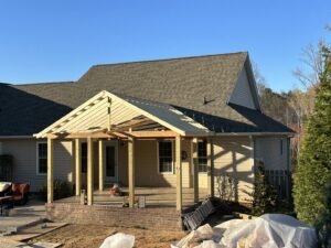 Covered patio framing under construction by Solid Rock Builders in Rock Hill, SC.
