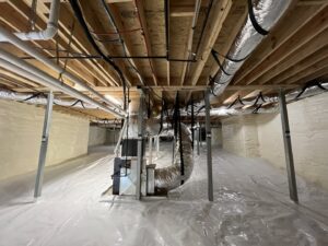 Completed crawl space encapsulation with spray foam insulation and vapor barrier by Off-Axis Spray Foam and Radon Services in Clarksville, TN.