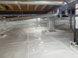 A clean crawl space with white encapsulation liner installed by The Basement Doctor in Reynoldsburg, OH.