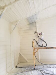 Spray foam insulation applied to the underside of a floor in a crawl space by Absolute Pro Insulation in Corpus Christi, TX.