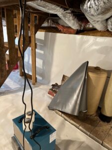 A completed crawlspace encapsulation with a dehumidifier installed by Appalachian Foundation Services in Roanoke, VA.