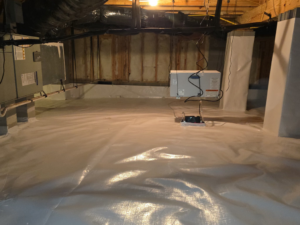 Crawlspace encapsulation with a dehumidifier installed by Vanco Crawlspace & Restoration in Kittrell, NC.