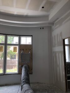 Curved tray ceiling drywall installation with visible HVAC duct by D&G Drywall in Fort Lauderdale, FL