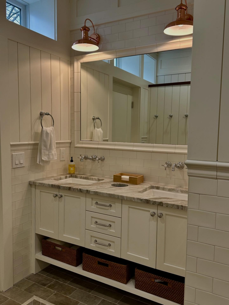 Custom bathroom vanity with double sinks and white cabinets installed by Lardieri's Custom Woodworking Company, Inc. in Lakewood, NJ.
