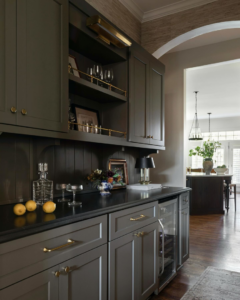 Custom built-in bar cabinetry with a countertop and wine fridge installed by ADAMS Pro Finish in Spring Hill, TN.