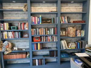 Custom built-in bookshelves with decorative shiplap backing installed by IGM Handyman Services in Meridian, ID.