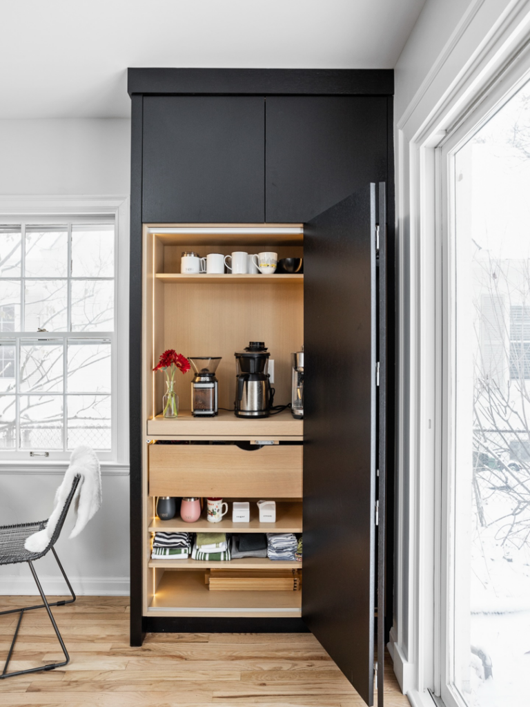 A custom-built coffee bar cabinet installed by Emergent Construction in Indianapolis, IN.