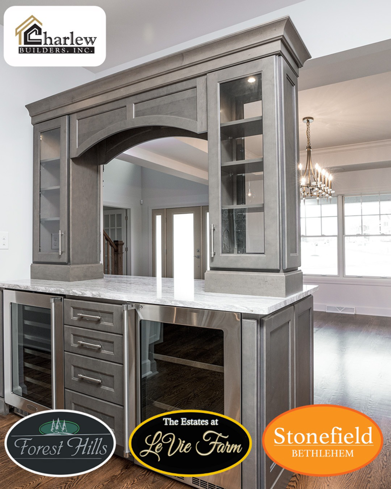 Custom built-in bar and cabinetry with a marble countertop, a project by Charlew Builders in Schenectady, NY.