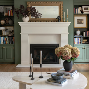 Custom built-in bookshelves and a classic white mantel fireplace by Brentwood Builders Inc., a general contractor in Lancaster, PA.