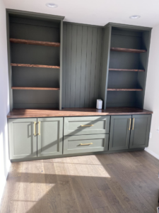 Custom built-in cabinetry with shelves and drawers installed by Andyman,LLC in Fredrick, MD.