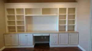 Custom built-in shelving and desk unit installed by Majestic Homes FW in Fort Wayne, IN.