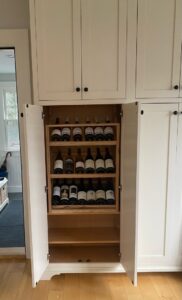 Custom built-in wine rack and cabinetry installed by CWS Handyman LLC in Seekonk, MA