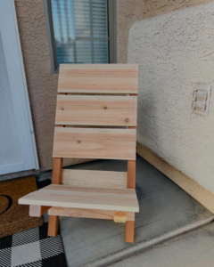 A newly custom-built small wooden chair by Peak Handyman Services in Las Vegas, NV.