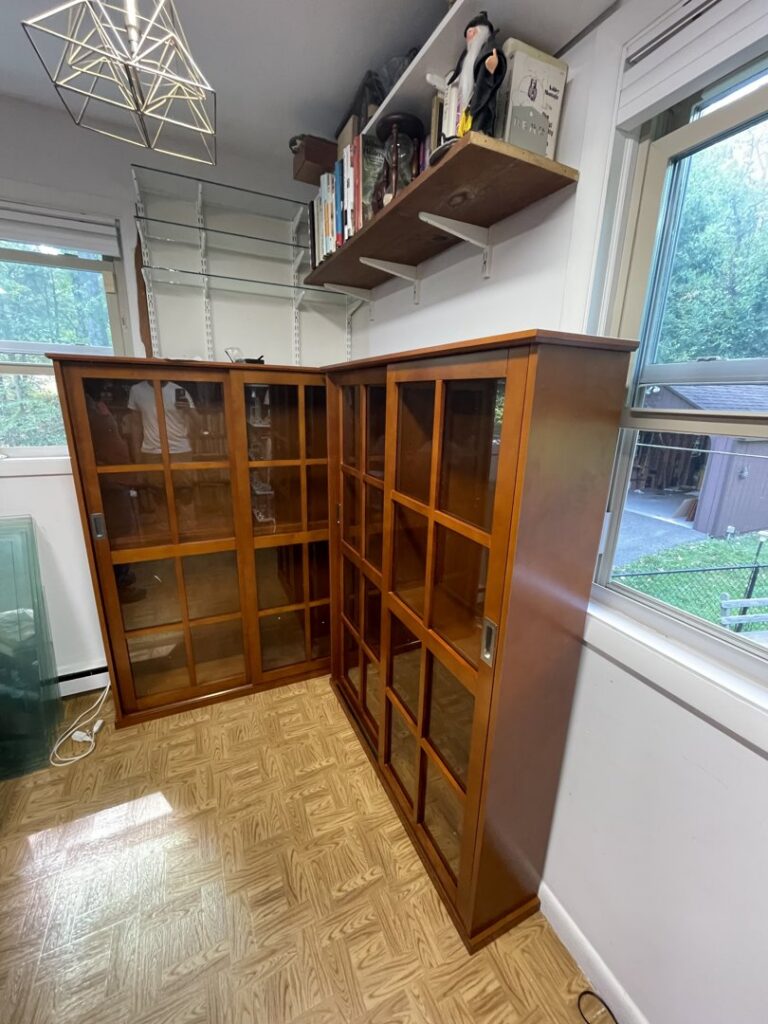 Custom cabinet and shelf installation completed in a room by JAC Home Improvement LLC in Danbury, CT.