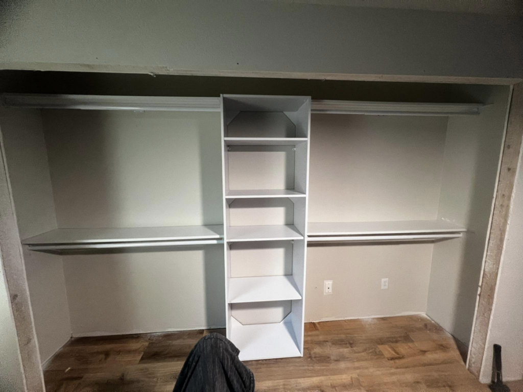 Custom closet organization system with shelves and rods installed by E&D Lozano Handyman in Caldwell, ID.