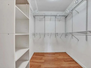 A newly installed custom closet shelving system by Gray Fox Enterprises in Roanoke, VA