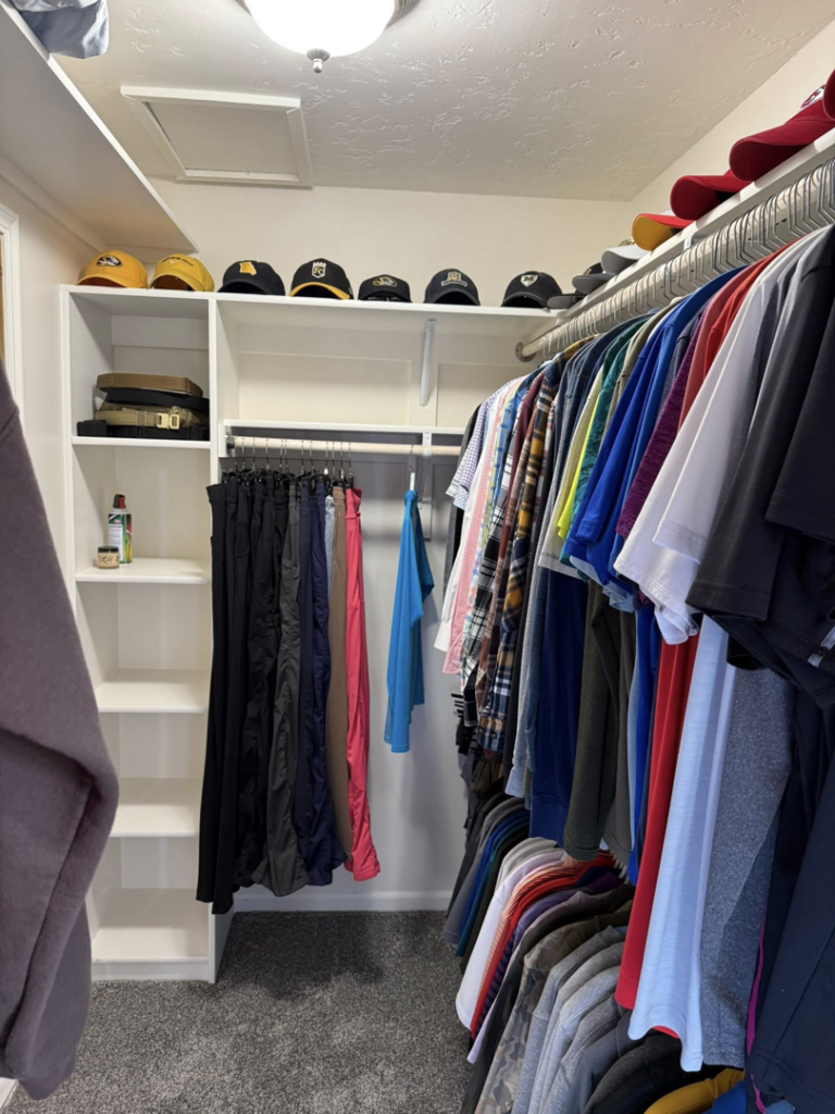 A custom closet shelving and organization system installed by M Squared Construction LLC in Tonganoxie, KS.
