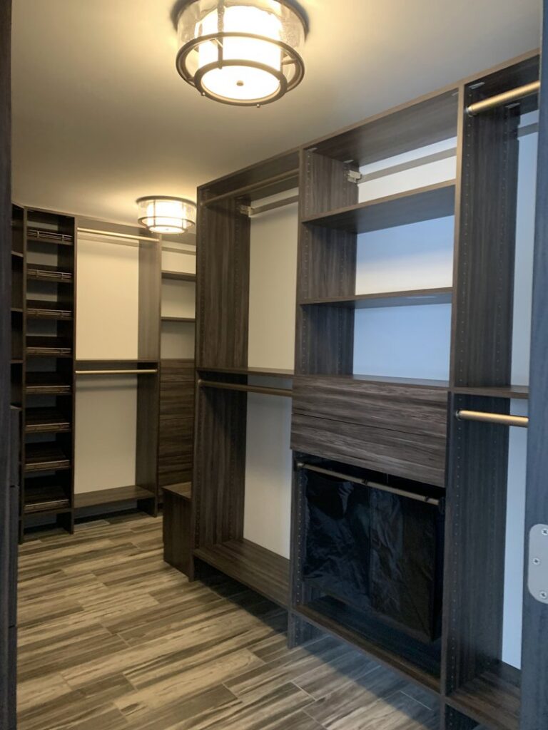 A newly installed custom closet shelving system by Waldron Construction, Kitchen & Bath in Antioch, IL