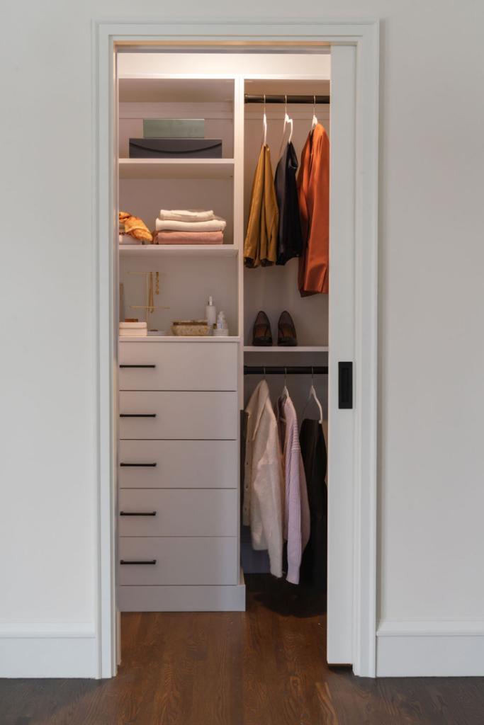 Installation of a custom closet system with shelves and drawers by Tusk Builders, offering handyman services in Minneapolis, MN.