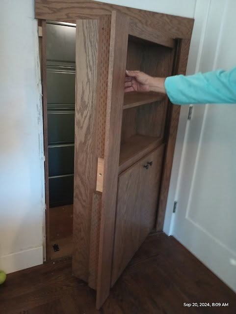 Custom hidden door bookshelf installation by Carpenter Joe's Handyman Service in Sacramento, CA