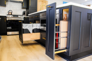 Custom kitchen island with pull-out trash and baking sheet drawers installed by Prestige Remodeling Solutions in Antioch, TN