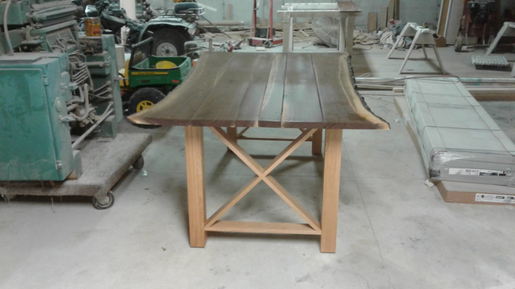 A custom live edge wood table crafted by Don's Custom Woodwork in Jefferson City, MO.