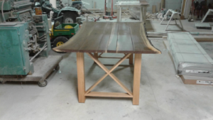 A custom live edge wood table crafted by Don's Custom Woodwork in Jefferson City, MO.