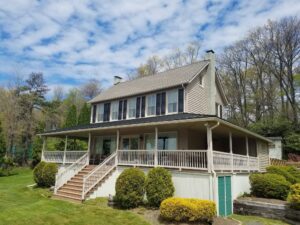 A custom residential house with a wrap-around porch, built by JON Construction, Inc. in Allentown, PA.