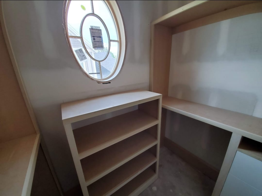 Detailed custom wooden shelving and storage solutions by Blue Ridge Customs LLC in Raleigh, NC.