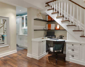 A custom-built office nook under a staircase, a project completed by Hawkins Enterprise Inc. in Norfolk, VA.
