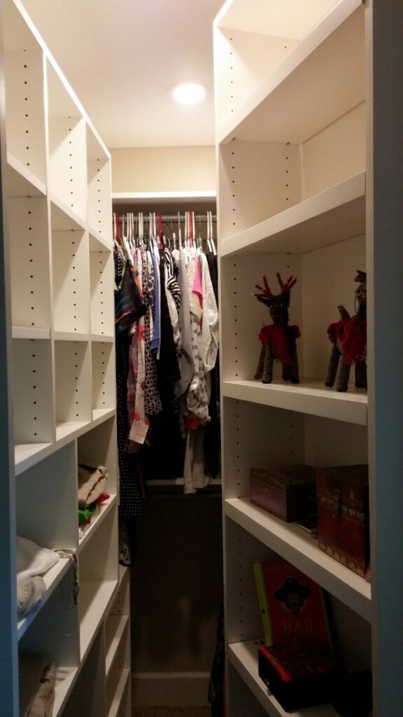 A custom-designed walk-in closet with new shelving installed by Constructed by 360 LLC in Meridian, ID.