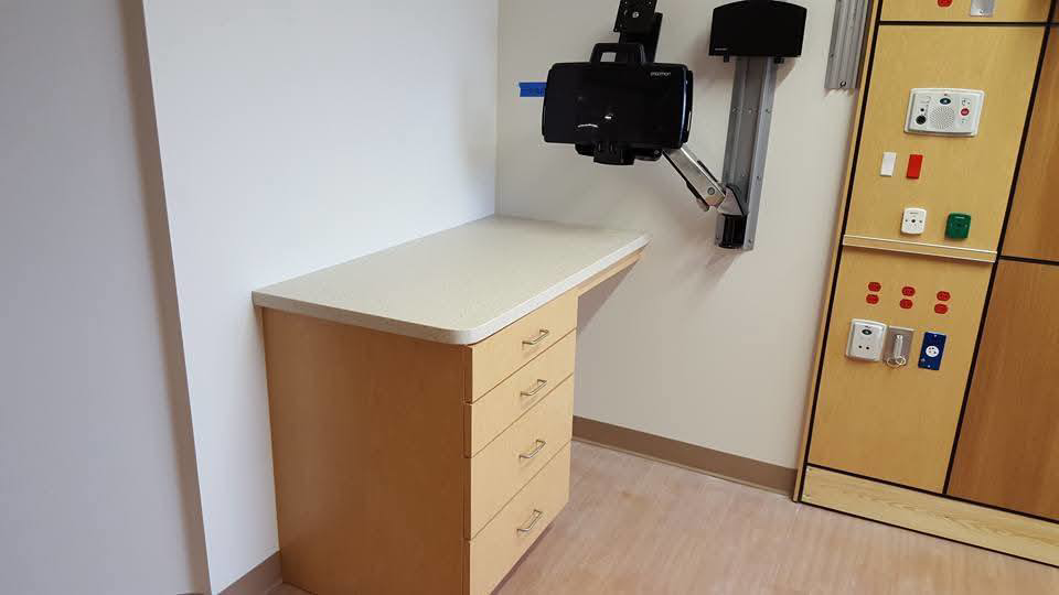 Custom wall-mounted desk and cabinetry installation by Zubieta Kitchen & Bath LLC in Augusta, GA.