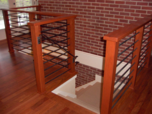 Custom wood and metal stair railings installed by Hessel Carpentry in Portland, OR.