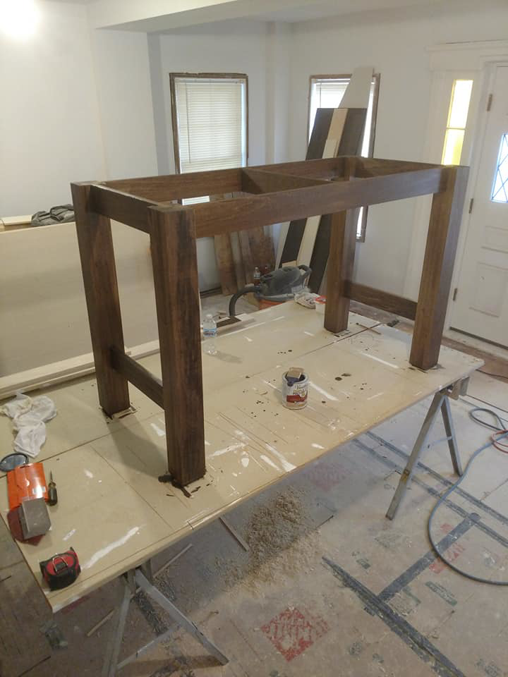 A custom wooden frame under construction, showing work in progress by V.F Contracting L.L.C in Parma, OH.