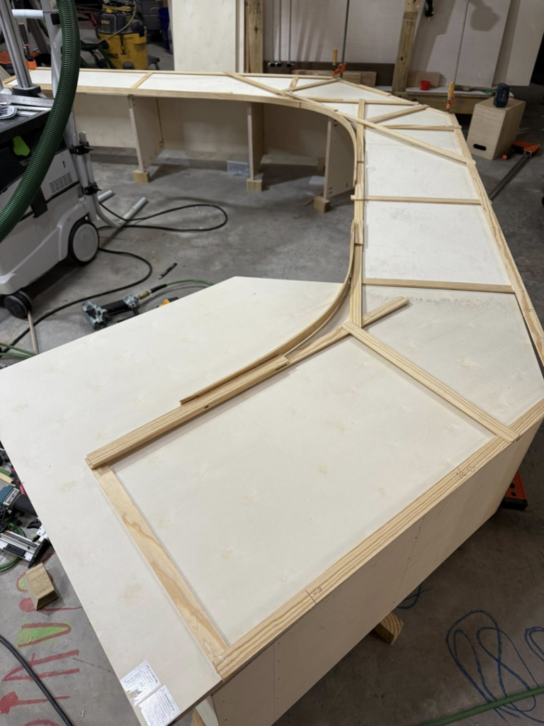 Custom wood framing being built for a countertop or bar, showcasing carpentry services by High Tide Home Remodeling in Charleston, SC.