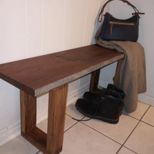 A custom-built wooden bench by Twenty-Three Roses Woodworks, perfect for an entryway in North Little Rock, AR.
