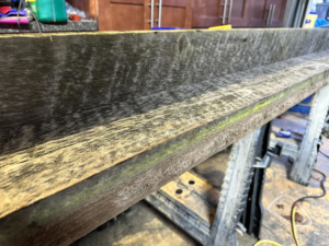 Close-up of a custom wooden board being prepared for finishing by Valleys Finest Custom Finishes LLC in Salem, OR.