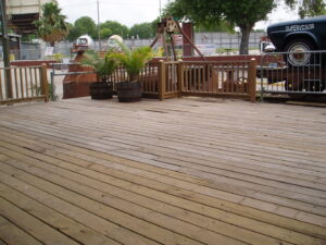 A spacious custom wooden deck, expertly constructed by Gourley Contractors, LLC, Corpus Christi, TX.
