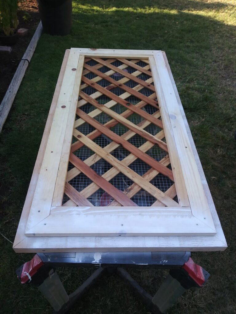 A custom wooden lattice panel being constructed on sawhorses by My Quality Handyman in Fresno, CA.