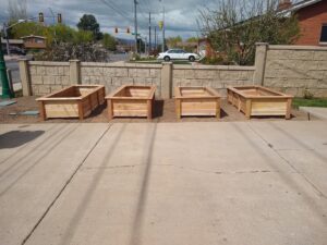 Custom wooden planter boxes built and installed by Shane's Handyman Service in Edmond, OK.