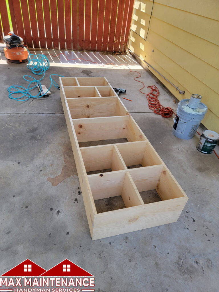 Custom wooden shelving unit built by Max Maintenance in Twin Falls, ID.