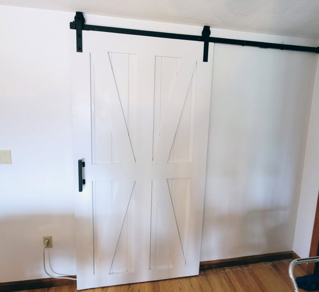 A custom woodworking project, possibly a furniture component, in progress in a workshop by Dovetails Services LLC in Derry, NH.
